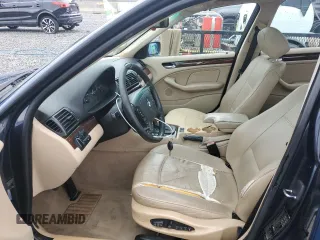 2000 BMW 3 Series 323i with VIN WBAAM3347YCA92579, listed as a Copart auction lot 60823235 with 216,510 mi miles and Salvage title. Bid and sale history available at DreamBid. Image 7.