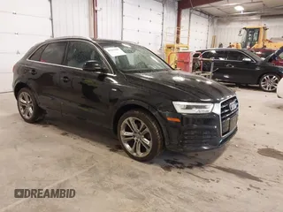 2018 Audi Q3 Premium Plus with VIN WA1JCCFS1JR018018, listed as a IAAI auction lot 42123107 with 72,883 mi miles and . Bid and sale history available at DreamBid. Image 1.