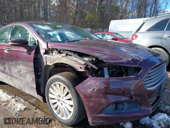 2013 Ford Fusion SE Hybrid z VIN 3FA6P0LU1DR251738, wystawiony jako IAAI lot #41576698 z przebiegiem 158 735 mil mil oraz . Historia ofert i sprzedaży dostępna na DreamBid. Obrazek 6.
