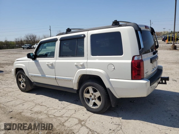 2010 Jeep Commander Sport with VIN 1J4RG4GKXAC121954, listed as a Copart auction lot 51965925 with 144,115 mi miles and Salvage title. Bid and sale history available at DreamBid. Image 2.