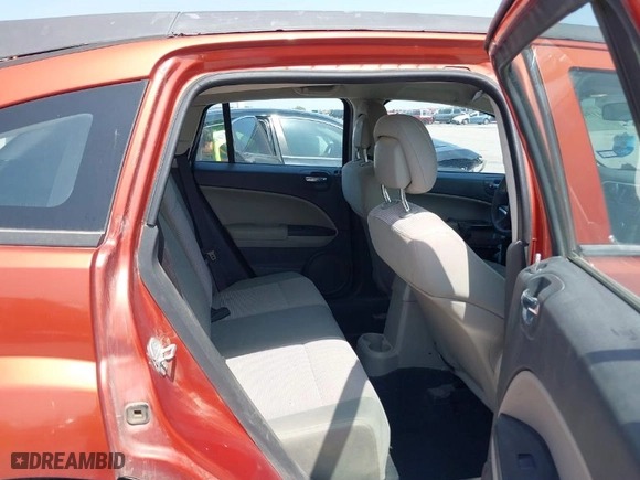 2010 Dodge Caliber SXT with VIN 1B3CB4HA9AD549848, listed as a IAAI auction lot 41915997 with 211,619 mi miles. Bid and sale history available at carsss.com. Image 8.