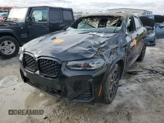 2024 BMW X4 xDrive30i z VIN 5UX33DT02R9U91458, wystawiony jako Copart lot #89126955 z przebiegiem Nie podano mil oraz Szkoda całkowita • Salvage title. Historia ofert i sprzedaży dostępna na DreamBid. Obrazek 1.