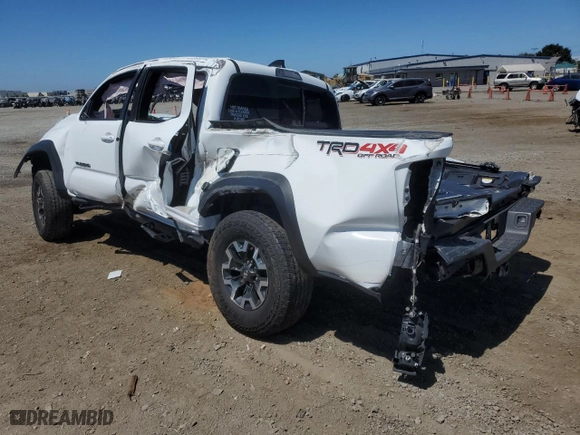 2023 Toyota Tacoma 4WD SR with VIN 3TMCZ5AN4PM541165, listed as a Copart auction lot 68909564 with 43,074 mi miles and Salvage Title. Bid and sale history available at carsss.com. Image 2.