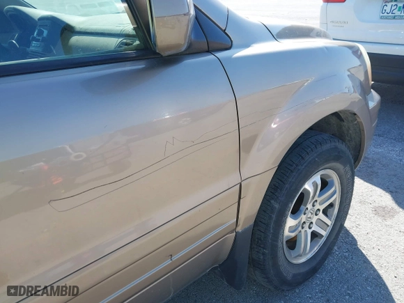 2003 Honda Pilot EX with VIN 2HKYF18513H547292, listed as a IAAI auction lot 41744101 with 236,852 mi miles. Bid and sale history available at carsss.com. Image 6.