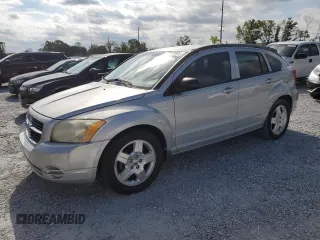 2009 Dodge Caliber SXT with VIN 1B3HB48AX9D157186, listed as a Copart auction lot 52892065 with 218,024 mi miles and Salvage Title. Bid and sale history available at carsss.com. Image 1.