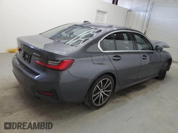 2019 BMW 3 Series 330i with VIN WBA5R1C56KFH04731, listed as a Copart auction lot 56854405 with 99,999 mi miles and Clean title. Bid and sale history available at DreamBid. Image 3.