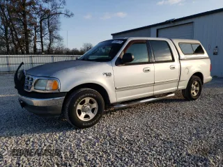 2003 Ford F-150 XLT with VIN 1FTRW07663KD78428, listed as a Copart auction lot 52673764 with 201,309 mi miles and Non Repairable. Bid and sale history available at carsss.com. Image 1.