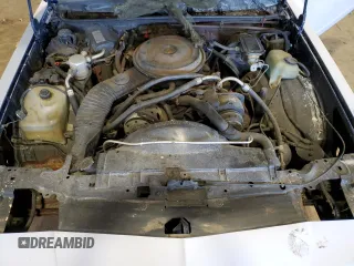 1988 Chevrolet Monte Carlo z VIN 1G1GZ11G3JP115201, wystawiony jako Copart lot #75502454 z przebiegiem 71 006 mil mil oraz Szkody całkowita. Historia ofert i sprzedaży dostępna na DreamBid. Obrazek 11.