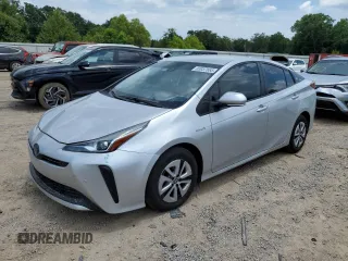 2021 Toyota Prius L Eco with VIN JTDKAMFU3M3129488, listed as a Copart auction lot 63037665 with 79,972 mi miles and Salvage title. Bid and sale history available at DreamBid. Image 1.