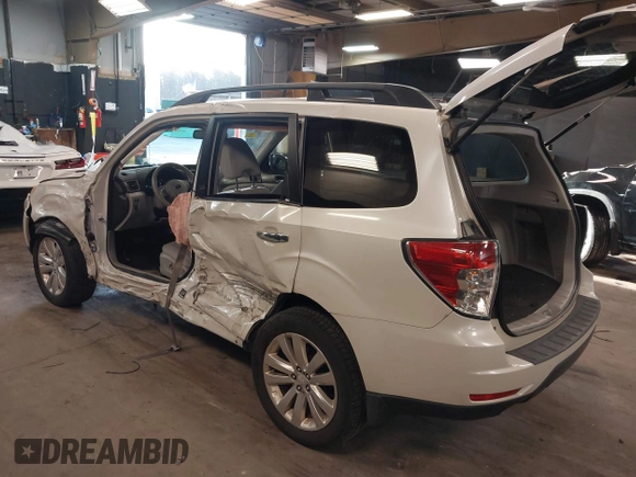 2012 Subaru Forester X Premium with VIN JF2SHADC8CH429115, listed as a IAAI auction lot 41863506 with 114,368 mi miles and . Bid and sale history available at DreamBid. Image 3.