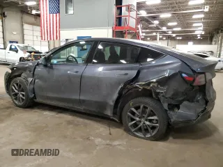 2023 Tesla Model Y Long Range with VIN 7SAYGDEE8PA034239, listed as a Copart auction lot 46429785 with 66,944 mi miles and Non Repairable. Bid and sale history available at DreamBid. Image 2.
