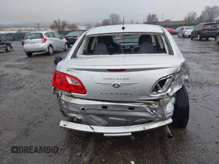 2010 Chrysler Sebring Touring z VIN 1C3CC4FB5AN128652, wystawiony jako IAAI lot #41863619 z przebiegiem 123 698 mil mil oraz . Historia ofert i sprzedaży dostępna na DreamBid. Obrazek 15.