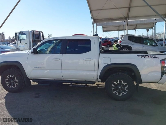 2021 Toyota Tacoma 2WD SR5 with VIN 3TMAZ5CN7MM144212, listed as a IAAI auction lot 41286049 with 75,113 mi miles. Bid and sale history available at carsss.com. Image 14.