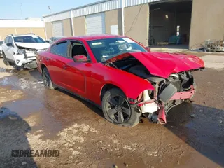 2011 Dodge Charger SE with VIN 2B3CL3CG9BH518638, listed as a IAAI auction lot 40511414 with 209,983 mi miles and . Bid and sale history available at carsss.com. Image 1.