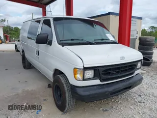 2001 Ford Econoline Cargo with VIN 1FTRE14261HA22632, listed as a IAAI auction lot 41202164 with 153,412 mi miles and . Bid and sale history available at carsss.com. Image 1.