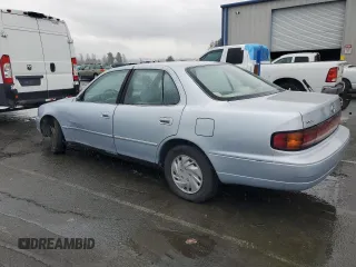 1994 Toyota Camry LE with VIN 4T1SK12E8RU411682, listed as a Copart auction lot 44153535 with 214,022 mi miles and Salvage Title. Bid and sale history available at carsss.com. Image 2.