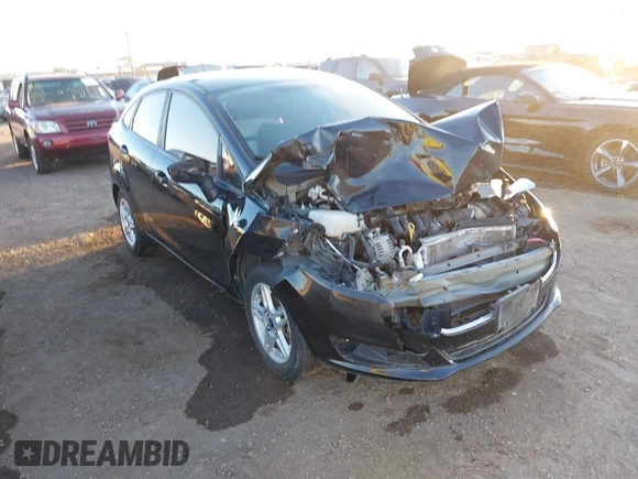 2018 Ford Fiesta SE with VIN 3FADP4BJ0JM121836, listed as a IAAI auction lot 41575608 with 74,010 mi miles. Bid and sale history available at carsss.com. Image 1.