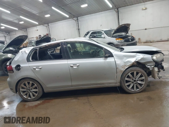 2012 Volkswagen Golf TDI with VIN WVWNM7AJ8CW333137, listed as a IAAI auction lot 42585466 with 213,587 mi miles and . Bid and sale history available at DreamBid. Image 13.