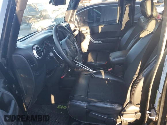 2012 Jeep Wrangler Unlimited Rubicon with VIN 1C4HJWFG1CL221083, listed as a Copart auction lot 80081654 with 163,912 mi miles and Salvage title. Bid and sale history available at DreamBid. Image 7.
