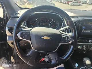 2022 Chevrolet Traverse LT Cloth z VIN 1GNERGKWXNJ145951, wystawiony jako IAAI lot #42429054 z przebiegiem 100 635 mil mil oraz . Historia ofert i sprzedaży dostępna na DreamBid. Obrazek 1.