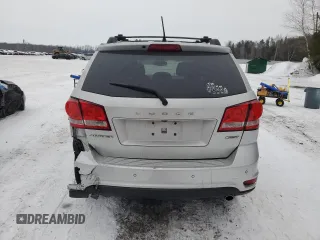 2013 Dodge Journey Crew with VIN 3C4PDCCG4DT698618, listed as a Copart auction lot 87632875 with 198,284 mi miles and Salvage title. Bid and sale history available at DreamBid. Image 6.
