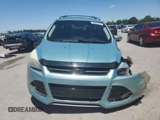 2013 Ford Escape Titanium с VIN 1FMCU0J98DUB77372, выставлен на аукционе Copart как лот 58006235 с пробегом 200 929 миль миль и Списание • Salvage title. История ставок и продаж доступна на DreamBid. Изображение 5.