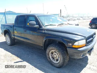 2000 Dodge Dakota Sport with VIN 1B7GG2AN7YS793734, listed as a IAAI auction lot 42735415 with 154,031 mi miles and . Bid and sale history available at DreamBid. Image 1.