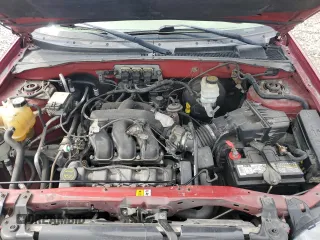 2005 Ford Escape Limited with VIN 1FMYU04165KA33277, listed as a Copart auction lot 54407625 with 217,317 mi miles and Salvage title. Bid and sale history available at DreamBid. Image 11.