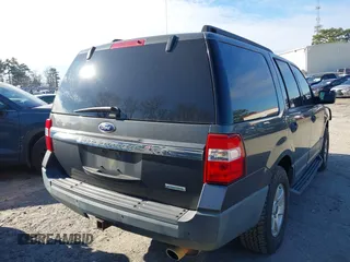 2015 Ford Expedition XL with VIN 1FMJU1FTXFEF10203, listed as a IAAI auction lot 41643079 with 181,558 mi miles. Bid and sale history available at carsss.com. Image 4.