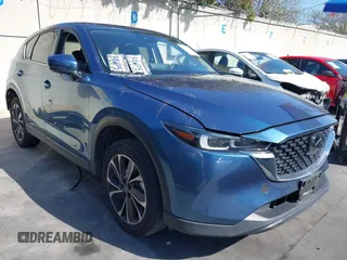 2022 Mazda CX-5 2.5 S Premium Package with VIN JM3KFBDM4N0573577, listed as a IAAI auction lot 41565905 with 49,130 mi miles. Bid and sale history available at carsss.com. Image 1.
