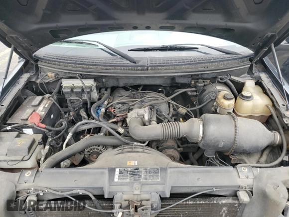 2007 Ford F-150 XL with VIN 1FTRF12207KD50317, listed as a Copart auction lot 58611805 with 122,940 mi miles and Salvage title. Bid and sale history available at DreamBid. Image 11.