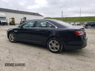 2013 Ford Taurus SEL z VIN 1FAHP2H84DG102036, wystawiony jako Copart lot #57772285 z przebiegiem 156 609 mil mil oraz Czysty tytuł • Clean title. Historia ofert i sprzedaży dostępna na DreamBid. Obrazek 2.