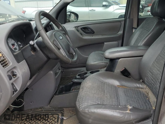 2002 Ford Escape XLS Choice with VIN 1FMYU02102KB67376, listed as a Copart auction lot 79109394 with 234,306 mi miles and Salvage title. Bid and sale history available at DreamBid. Image 7.