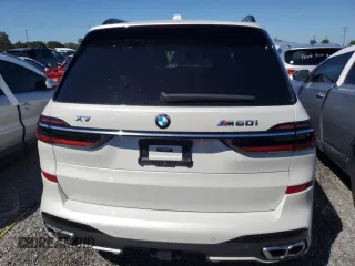 2023 BMW X7 M60i z VIN 5UX33EM07P9P54139, wystawiony jako Copart lot #74120224 z przebiegiem Nie podano mil oraz Szkoda całkowita • Salvage title. Historia ofert i sprzedaży dostępna na DreamBid. Obrazek 6.