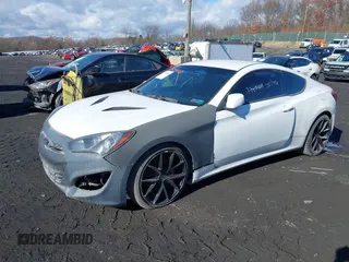 2013 Hyundai Genesis Coupe Grand Touring with VIN KMHHU6KJ7DU096543, listed as a IAAI auction lot 33714958 with 129,768 mi miles and . Bid and sale history available at DreamBid. Image 2.