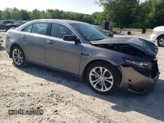 2013 Ford Taurus SHO with VIN 1FAHP2KT9DG139953, listed as a Copart auction lot 60977295 with 196,162 mi miles and Clean title. Bid and sale history available at DreamBid. Image 4.