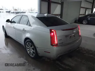 2009 Cadillac CTS RWD w/1SB with VIN 1G6DV57V090157738, listed as a IAAI auction lot 41180254 with 129,361 mi miles. Bid and sale history available at carsss.com. Image 3.