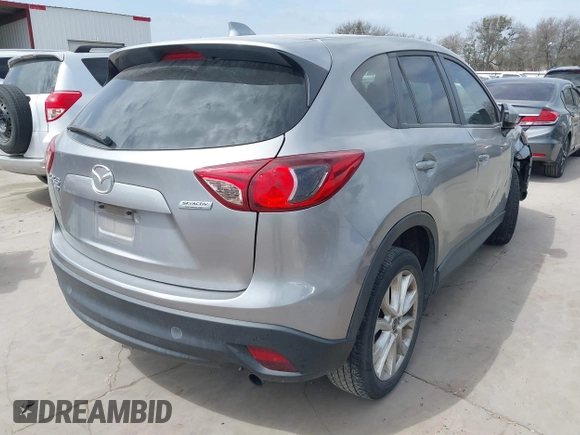 2013 Mazda CX-5 Grand Touring with VIN JM3KE4DE6D0160713, listed as a IAAI auction lot 41749221 with 158,056 mi miles. Bid and sale history available at carsss.com. Image 4.