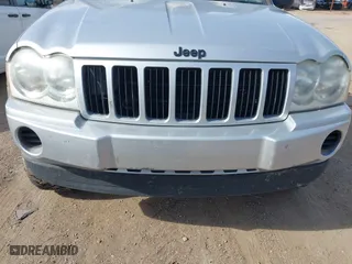 2005 Jeep Grand Cherokee Laredo with VIN 1J4GR48K15C542354, listed as a IAAI auction lot 41940355 with 158,065 mi miles. Bid and sale history available at carsss.com. Image 12.