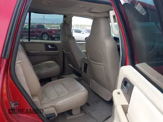 2004 Ford Expedition Eddie Bauer with VIN 1FMPU17LX4LB81956, listed as a IAAI auction lot 42064799 with 142,049 mi miles. Bid and sale history available at carsss.com. Image 8.
