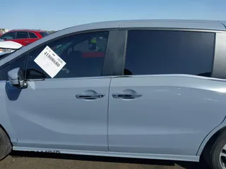 2024 Honda Odyssey Touring with VIN 5FNRL6H82RB027601, listed as a IAAI auction lot 41808680 with 25,911 mi miles and . Bid and sale history available at DreamBid. Image 14.