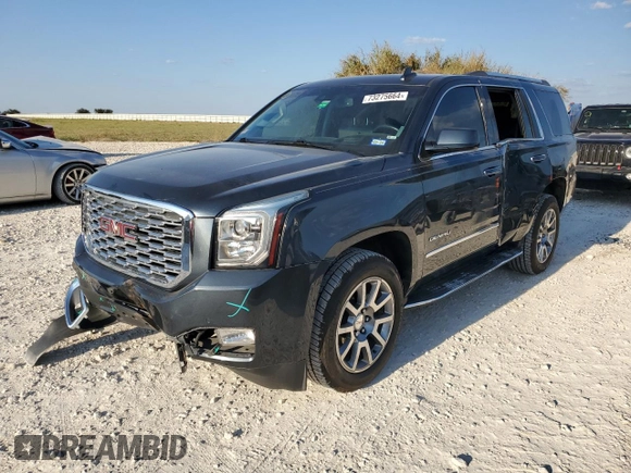 2019 GMC Yukon Denali with VIN 1GKS1CKJ9KR134571, listed as a Copart auction lot 73275664 with 50,853 mi miles and Salvage Title. Bid and sale history available at carsss.com. Image 1.