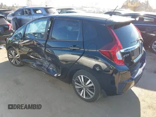 2016 Honda Fit EX with VIN JHMGK5H75GX006464, listed as a IAAI auction lot 41852218 with 30,990 mi miles and . Bid and sale history available at DreamBid. Image 3.