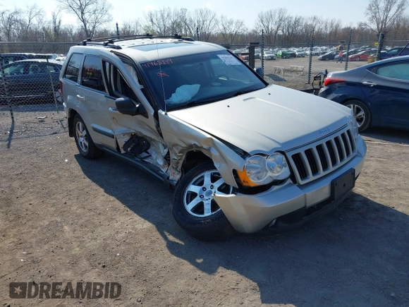 2008 Jeep Grand Cherokee Laredo with VIN 1J8GR48K28C169859, listed as a IAAI auction lot 41965149 with 166,069 mi miles. Bid and sale history available at carsss.com. Image 1.