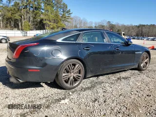 2015 Jaguar XJ with VIN SAJWA2GT8FMV83276, listed as a Copart auction lot 86521754 with 105,010 mi miles and Salvage Title. Bid and sale history available at DreamBid. Image 3.