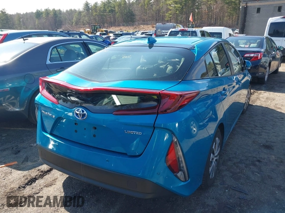 2021 Toyota Prius LE with VIN JTDKAMFP1M3166050, listed as a IAAI auction lot 41831145 with 54,350 mi miles and . Bid and sale history available at DreamBid. Image 4.