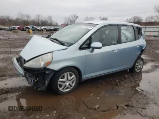 2007 Honda Fit z VIN JHMGD38427S036930, wystawiony jako Copart lot #51521795 z przebiegiem 107 248 mil mil oraz Szkoda całkowita • Salvage title. Historia ofert i sprzedaży dostępna na DreamBid. Obrazek 1.