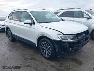 2021 Volkswagen Tiguan S with VIN 3VV1B7AX5MM045667, listed as a IAAI auction lot 41256945 with 90,523 mi miles. Bid and sale history available at carsss.com. Image 1.