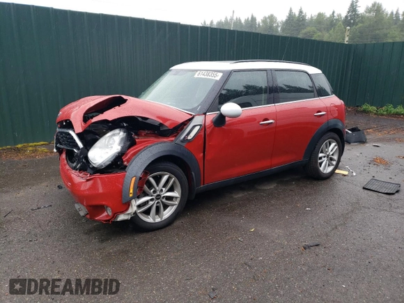 2014 MINI Countryman S with VIN WMWZC3C52EWP25379, listed as a Copart auction lot 61438355 with 76,943 mi miles and Salvage title. Bid and sale history available at DreamBid. Image 1.