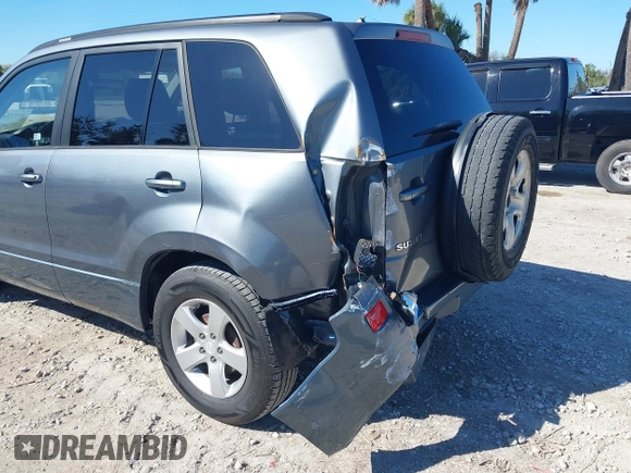 2006 Suzuki Grand Vitara Premium z VIN JS3TD943064100693, wystawiony jako IAAI lot #41772479 z przebiegiem 135 901 mil mil oraz . Historia ofert i sprzedaży dostępna na DreamBid. Obrazek 13.